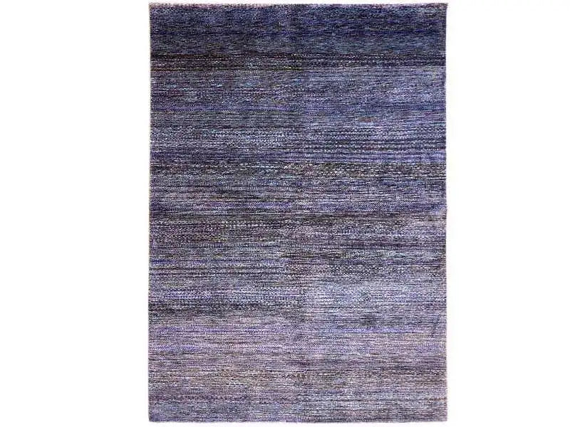 A beautiful gabbeh lori rug in a crisp blue color.